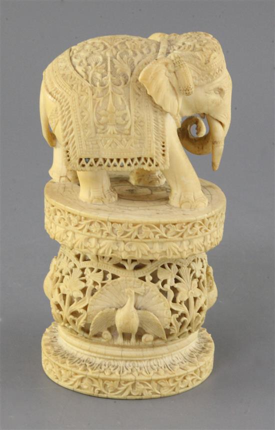 An Indian or Burmese ivory figure of an elephant, late 19th century, height 20cm, one tusk lacking